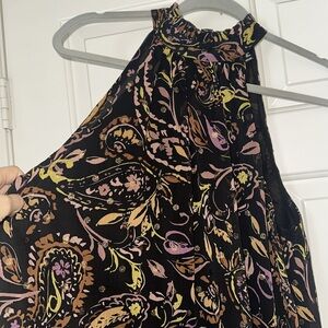 Aqua sleeveless mock collar top.